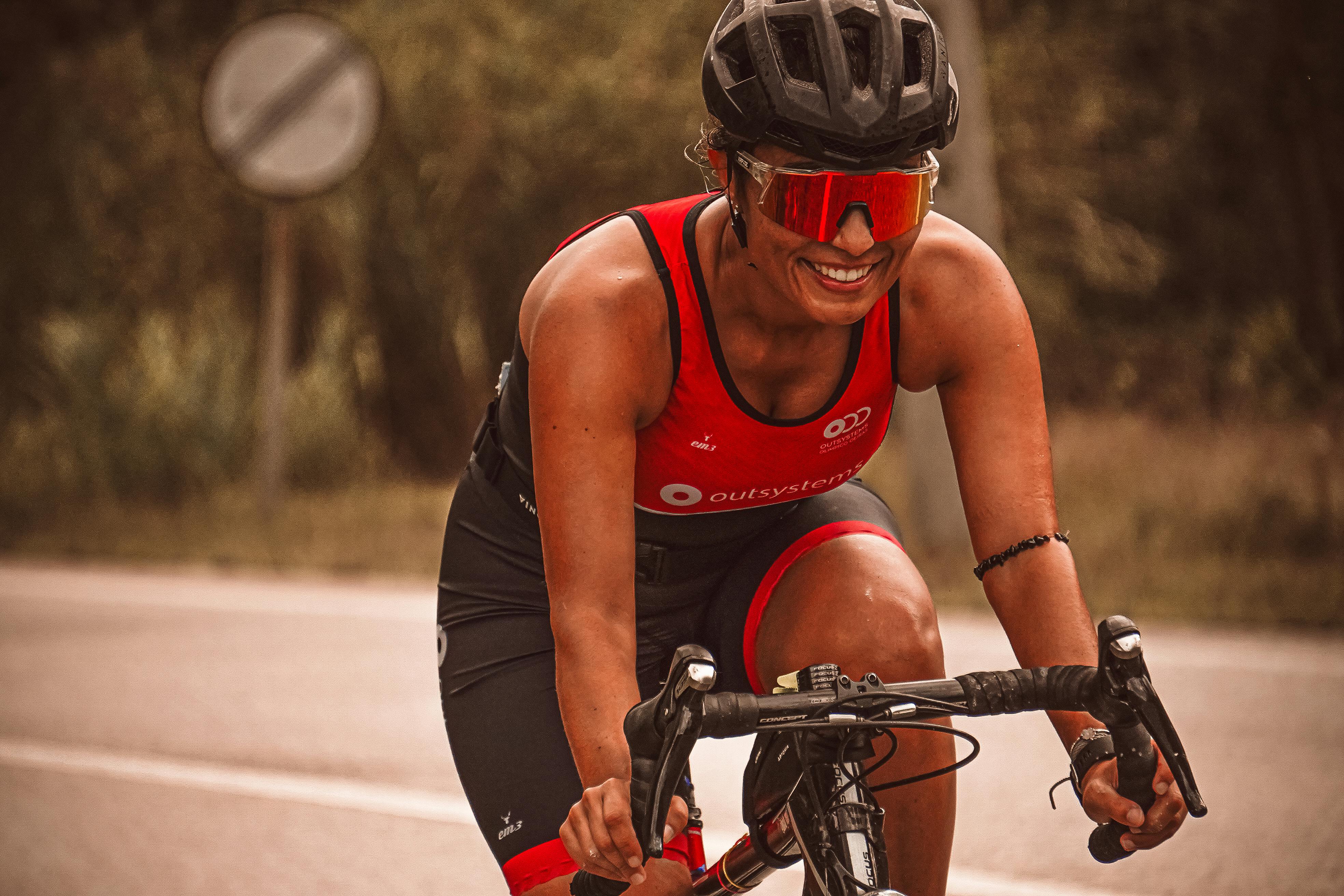 Cyclist on a road with sport sunglasses, motion blur background